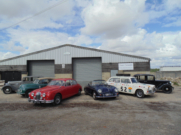 Barn showing some cars
